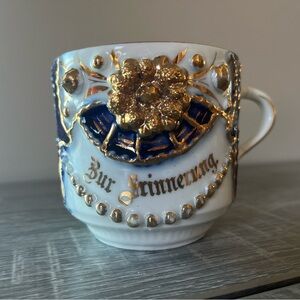 Elegant Gold and Blue Decorative Mug German